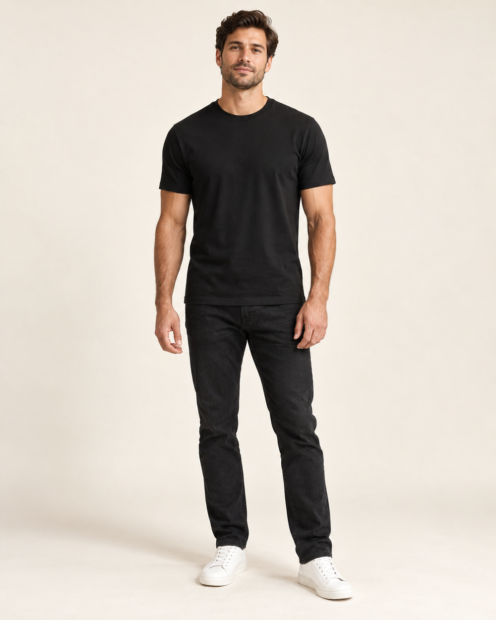 Man wearing a fitted black premium T-shirt